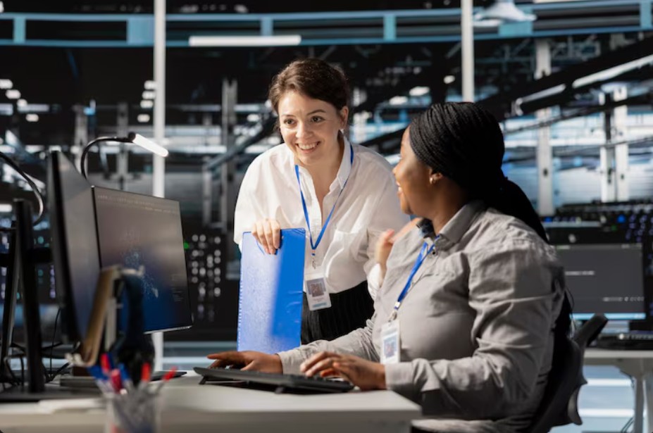 Two women provide IT support for small companies in Asheville, NC, focusing on secured cybersecurity and IT solutions.